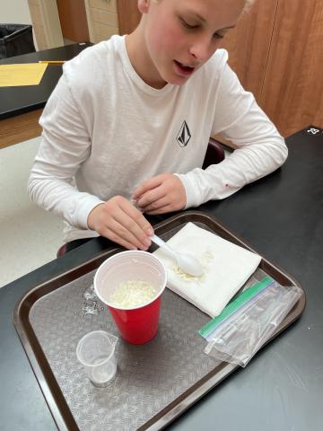 student making milk plastic 