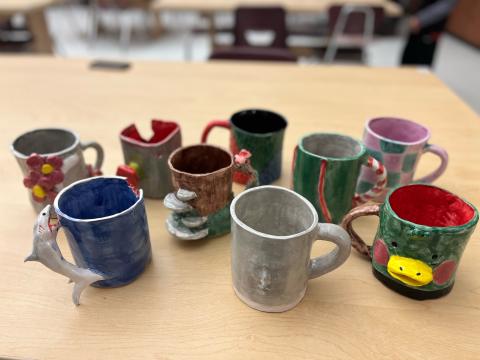 displays of all the mugs made in class 