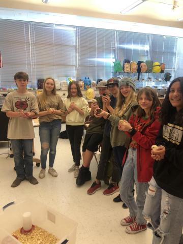 exploring agriculture class holding their chicks