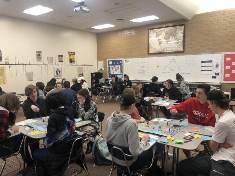 students playing board games in history