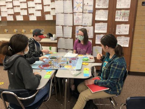 students playing board games in history
