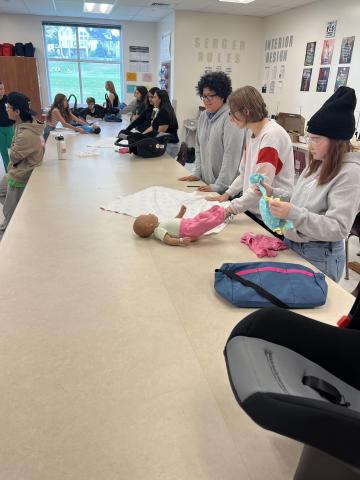 learning how to care for infant simulators 