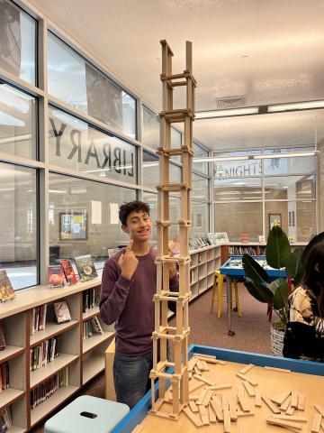 students using building blocks in the library 